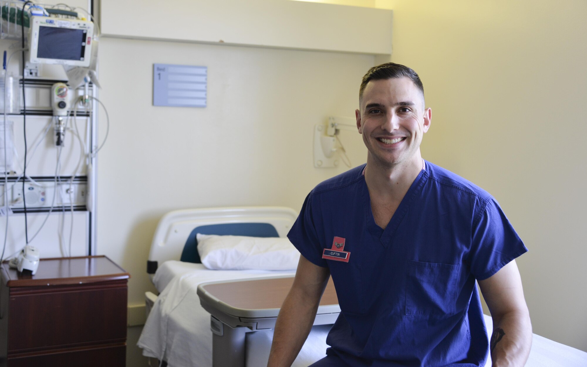 Airman 1st Class Benjamin Clifton, 60th IPTS surgical inpatient medical technician, poses for a photo Aug. 23 at Travis Air Force Base, California.