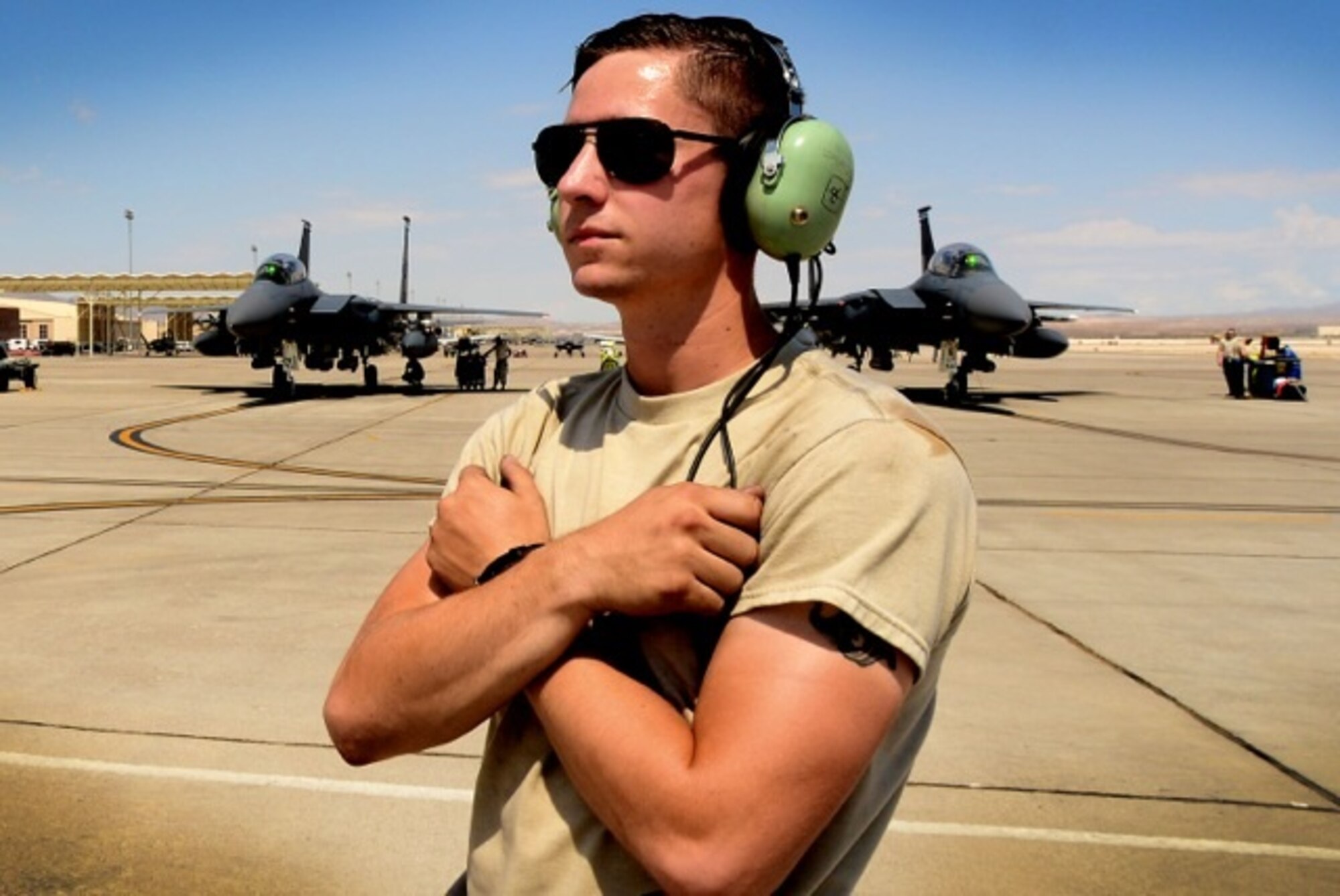 U.S. Air Force Staff Sgt. Gabriel Roth, 48th Aircraft Maintenance Squadron dedicated crew chief prepares to marshal out an F-15E Strike Eagle in support of Red Flag 16-4 at Nellis Air Force Base, Nevada Aug 22. Red Flag is the U.S. Air Force’s premier air-to-air combat training exercise and one of a series of advanced training programs that is administered by the U.S. Air Force Warfare Center and executed through the 414th Combat Training Squadron. (U.S. Air Force photo/ Tech. Sgt. Matthew Plew)