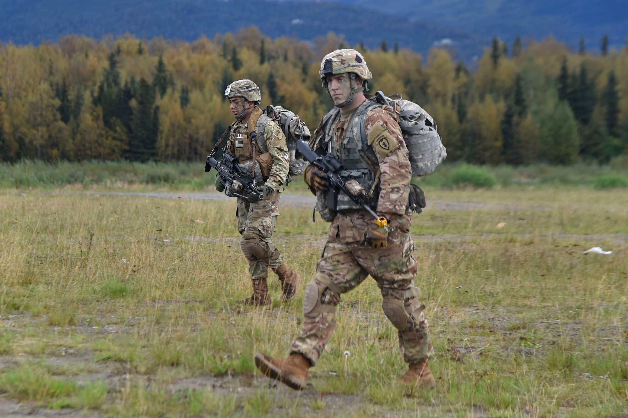 Paratroopers assigned to the 1st Battalion, 501st Parachute Infantry Regiment, 4th Infantry Brigade Combat Team (Airborne), 25th Infantry Division, U.S. Army Alaska, participate in a joint forcible entry exercise at Malemute Drop Zone on Joint Base Elmendorf-Richardson, Alaska, Aug. 23, 2016, as part of Exercise Spartan Agoge. Spartan Agoge is a brigade-level field training exercise that began Aug. 15, and focuses on an array of combat-related tasks from squad live-fire exercises to helicopter air insertion and airborne assault training. (U.S. Air Force photo by Airman 1st Class Valerie Monroy)