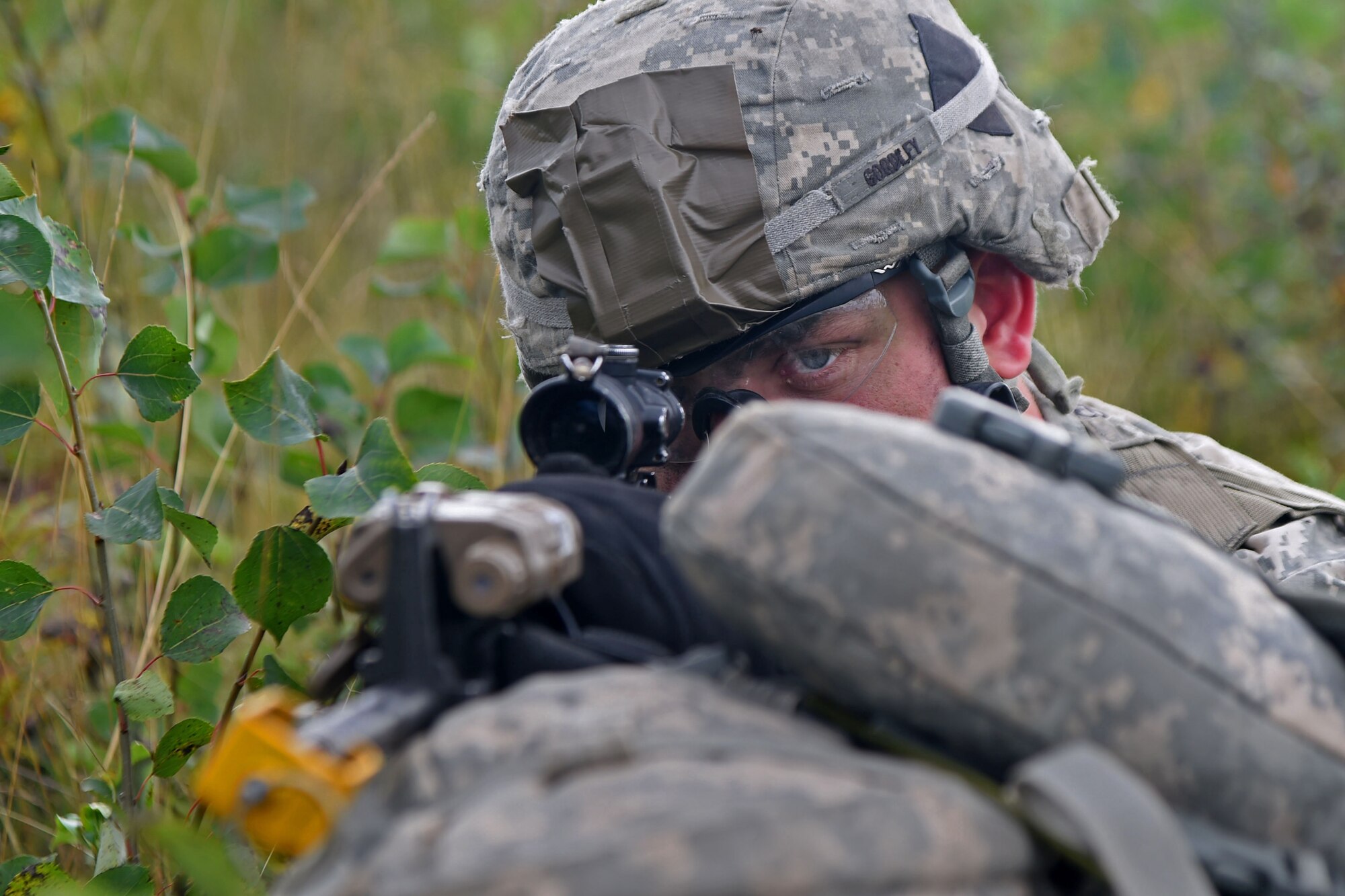 Army Sgt. Brock Gordley, a native of Maryville, Tennessee, assigned to the 1st Battalion, 501st Parachute Infantry Regiment, 4th Infantry Brigade Combat Team (Airborne), 25th Infantry Division, U.S. Army Alaska, participates in a joint forcible entry exercise at Malemute Drop Zone on Joint Base Elmendorf-Richardson, Alaska, Aug. 23, 2016, as part of Exercise Spartan Agoge. Spartan Agoge is a brigade-level field training exercise that began Aug. 15, and focuses on an array of combat-related tasks from squad live-fire exercises to helicopter air insertion and airborne assault training. (U.S. Air Force photo by Airman 1st Class Valerie Monroy)