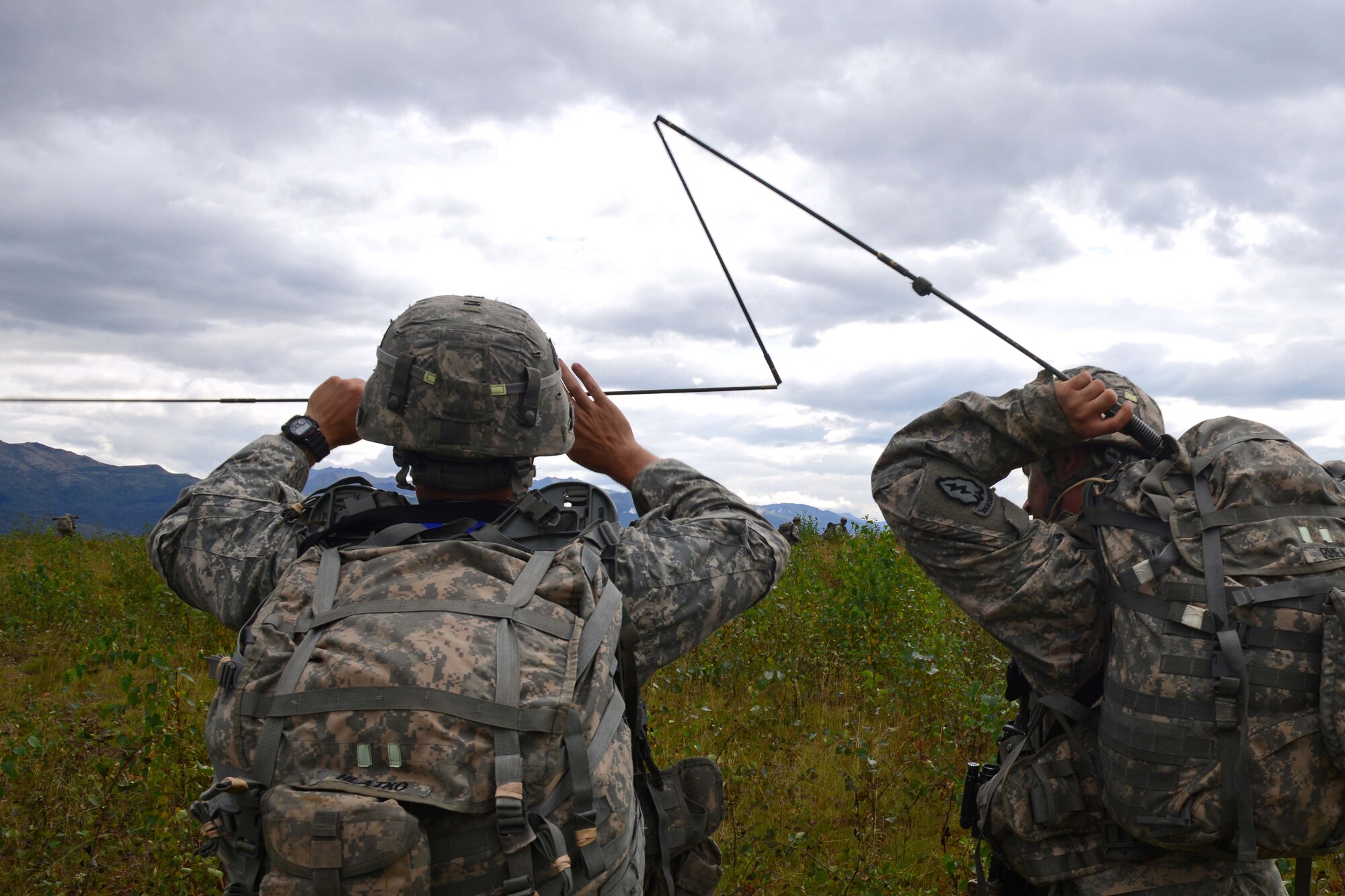 Paratroopers assigned to 1st Battalion, 501st Parachute Infantry Regiment, 4th Infantry Brigade Combat Team (Airborne), 25th Infantry Division, U.S. Army Alaska, ready a radio antenna during a joint forcible entry exercise at Malemute Drop Zone on Joint Base Elmendorf-Richardson, Alaska, Aug. 23, 2016, as part of Exercise Spartan Agoge. Spartan Agoge is a brigade-level field training exercise that began Aug. 15, focused on an array of combat-related tasks from squad live-fire exercises to helicopter air insertion and airborne training. (U.S. Air Force Airman 1st Class Javier Alvarez)