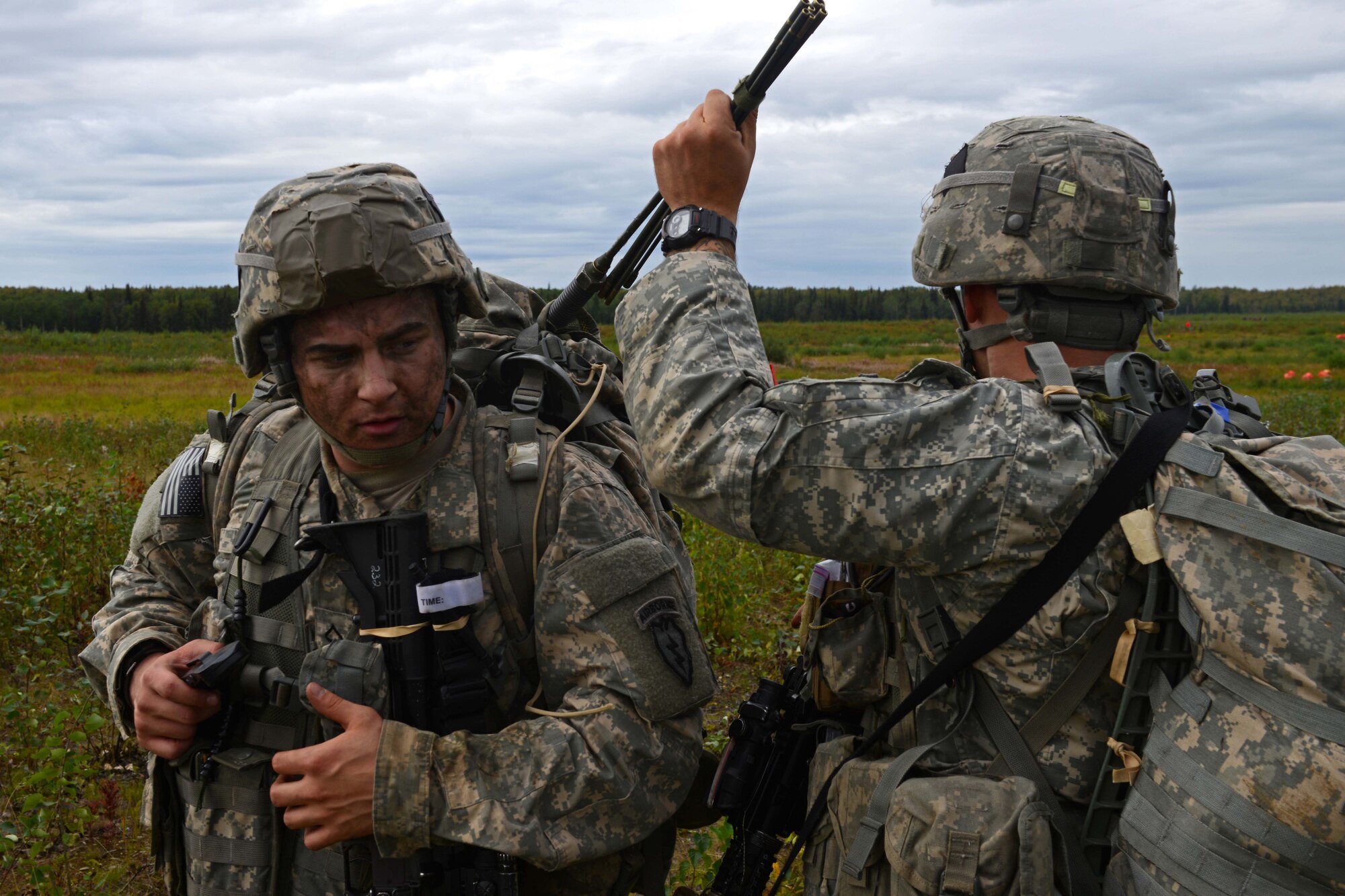Paratroopers assigned to 1st Battalion, 501st Parachute Infantry Regiment, 4th Infantry Brigade Combat Team (Airborne), 25th Infantry Division, U.S. Army Alaska, ready a radio antenna during a joint forcible entry exercise at Malemute Drop Zone on Joint Base Elmendorf-Richardson, Alaska, Aug. 23, 2016, as part of Exercise Spartan Agoge. Spartan Agoge is a brigade-level field training exercise that began Aug. 15, focused on an array of combat-related tasks from squad live-fire exercises to helicopter air insertion and airborne training. (U.S. Air Force Airman 1st Class Javier Alvarez)
