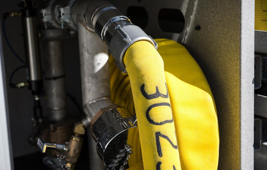 A hose allows water to flow into a depleted fire truck during a joint live fire training exercise, Aug. 24, 2016 at Moody Air Force Base, Ga. One critical part of a firefighter’s routine is maintaining equipment so it is always in working order . (U.S. Air Force photo by Airman 1st Class Janiqua P. Robinson)