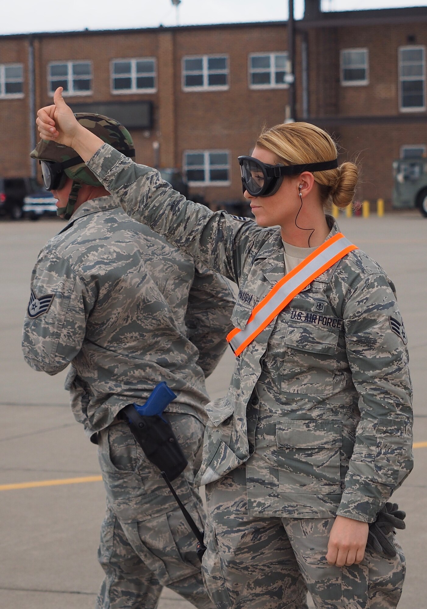 Air Force Reservists load 'patients' on to a C-130 with engines running at Minneapolis-St. Paul Air Reserve Station, Minn.  as part of exercise Patriot Warrior.  The multiservice exercise was designed to test the ability of medical personnel to treat patients in the field and transfer them to larger better equipped facilities during simulated wartime conditions.   