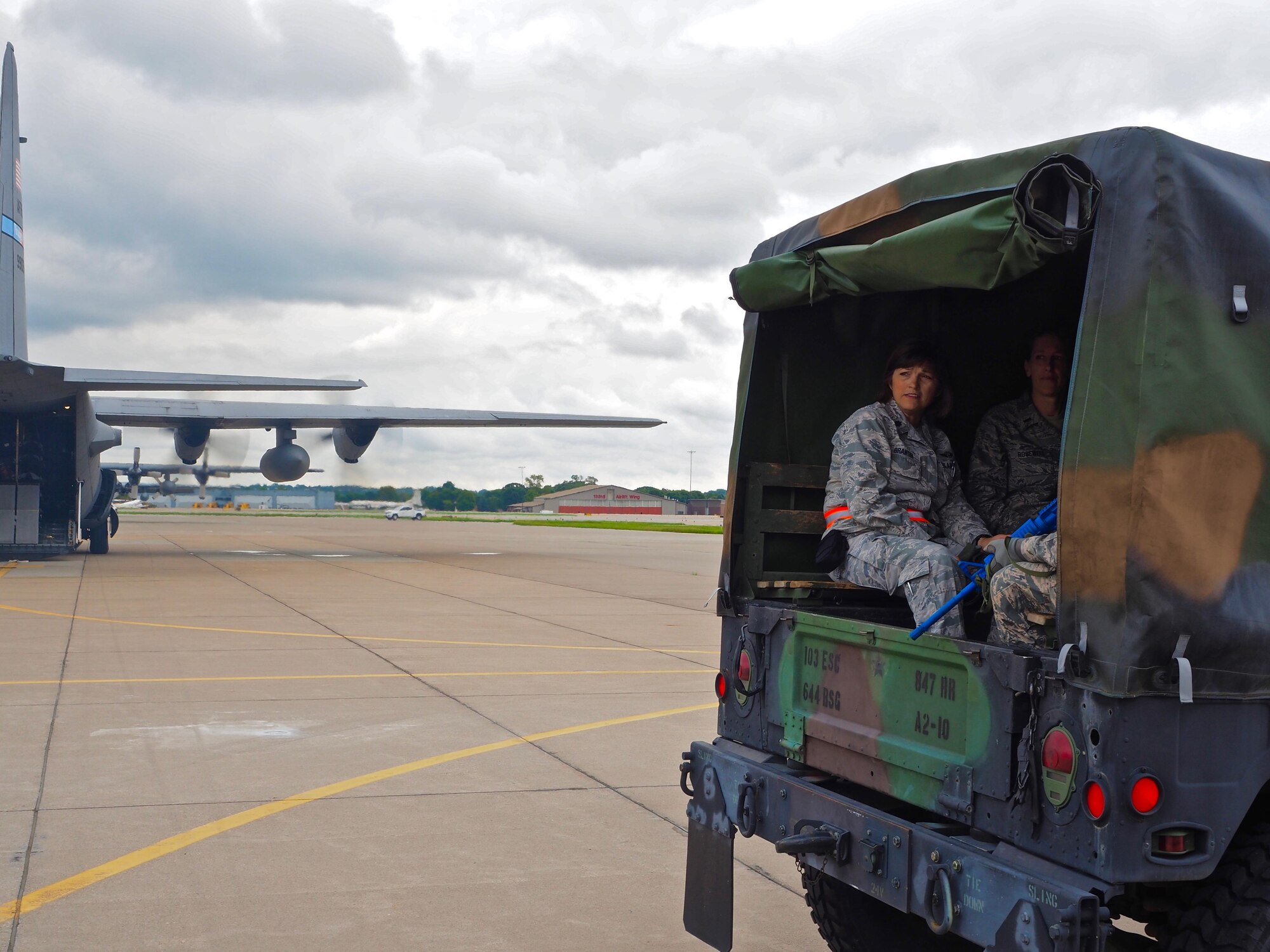 Air Force Reservists load 'patients' on to a C-130 with engines running at Minneapolis-St. Paul Air Reserve Station, Minn.  as part of exercise Patriot Warrior.  The multiservice exercise was designed to test the ability of medical personnel to treat patients in the field and transfer them to larger better equipped facilities during simulated wartime conditions.   