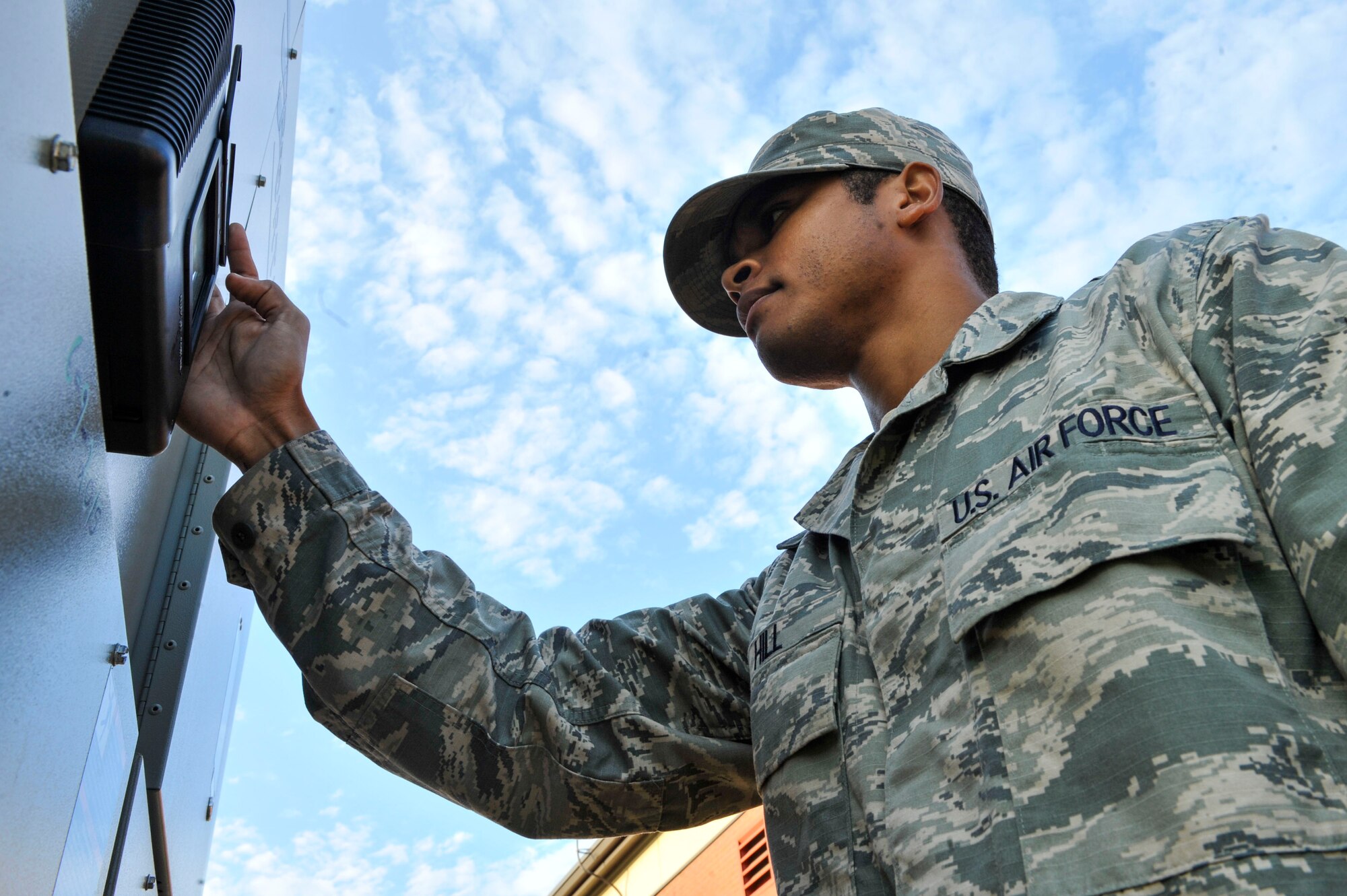 U.S. Air Force Senior Airman Pierre Hill, 19th Civil Engineer Squadron heating, ventilating and air conditioning journeyman, performs an operational check on a portable chiller unit Aug. 9, 2016, at Little Rock Air Force Base, Ark. Operational checks are performed daily to ensure the units are working properly. (U.S. Air Force photo by Senior Airman Stephanie Serrano) 