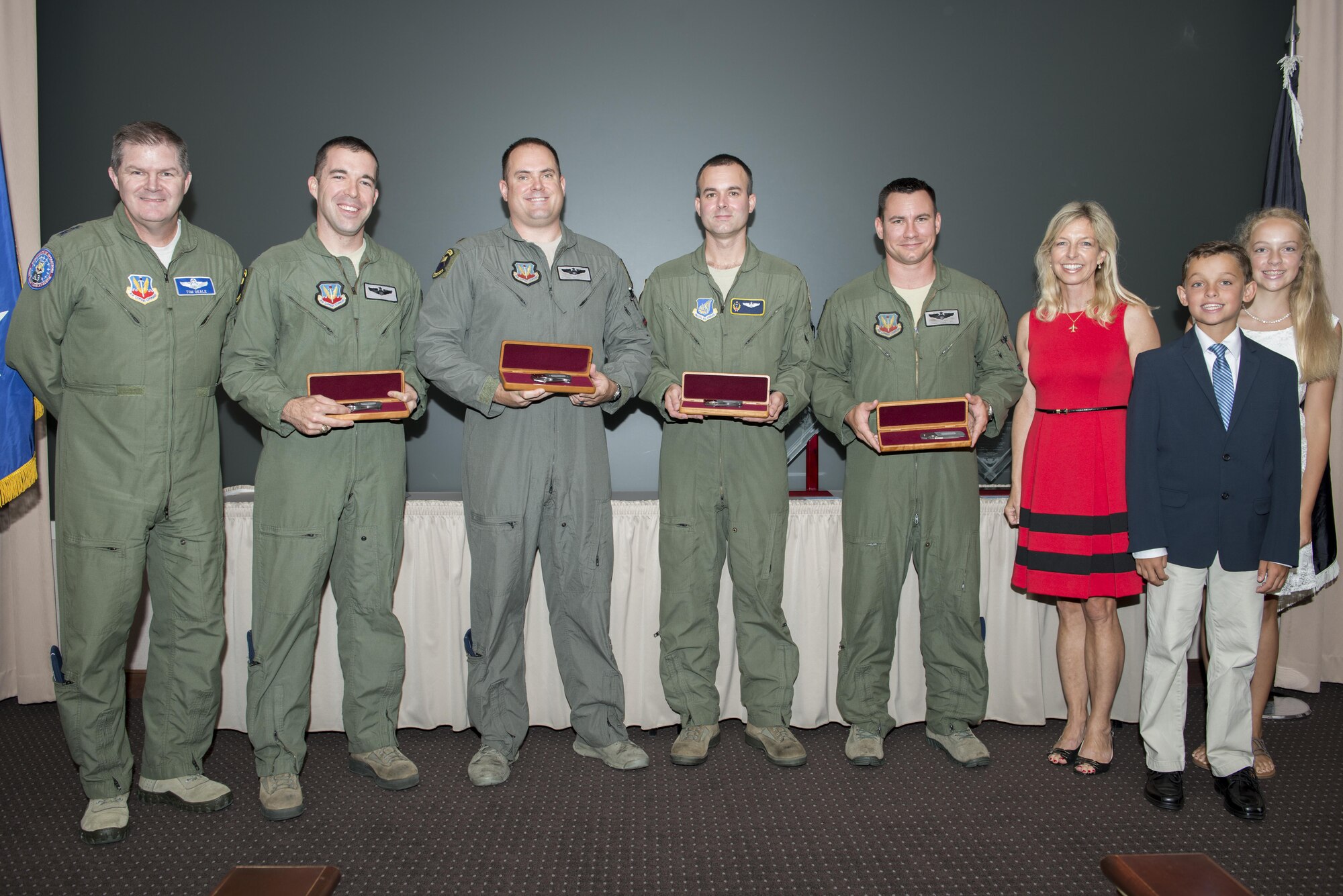 The 2011, 2012, 2014 and 2015 Lt. Col. Anthony C. Shine Fighter Pilot Award winners received engraved knives from Shine’s family during a ceremony at Joint Base Langley-Eustis, Va., Aug. 11, 2016. Maj. Gen. Thomas Deale, left, the Air Combat Command Headquarters director of operations, presented the winners their awards with the Shine family. (U.S. Air Force photo/Staff Sgt. R. Alex Durbin)