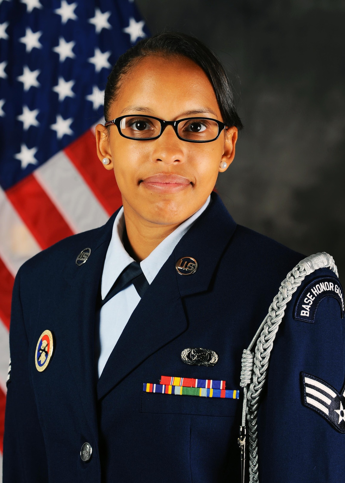 U.S. Air Force Senior Airman Shannon Hall takes a photo in her honor guard uniform June 14, 2013, at Dyess Air Force Base, Texas. Hall was a member of the Dyess Honor Guard from April to June 2013, where she completed numerous details for funerals, retirements and other official ceremonies. (U.S. Air Force photo by Airman 1st Class Jonathan Stefanko/Released)
