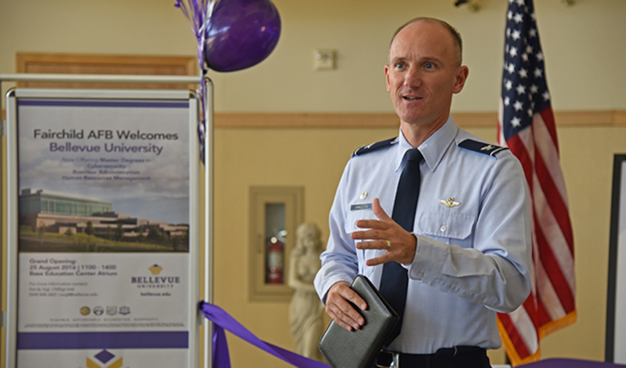 Col. Ryan Samuelson, 92nd Air Refueling Wing commander, discusses the important role education plays in the Air Force during the ribbon-cutting ceremony for Bellevue University Aug. 25, 2016, at Fairchild Air Force Base. Bellevue University is one of four schools the base education center offers. Bellevue is a private, regionally accredited, non-profit school nationally recognized as a military-friendly institution. (U.S. Air Force photo/Airman 1st Class Mackenzie Richardson)