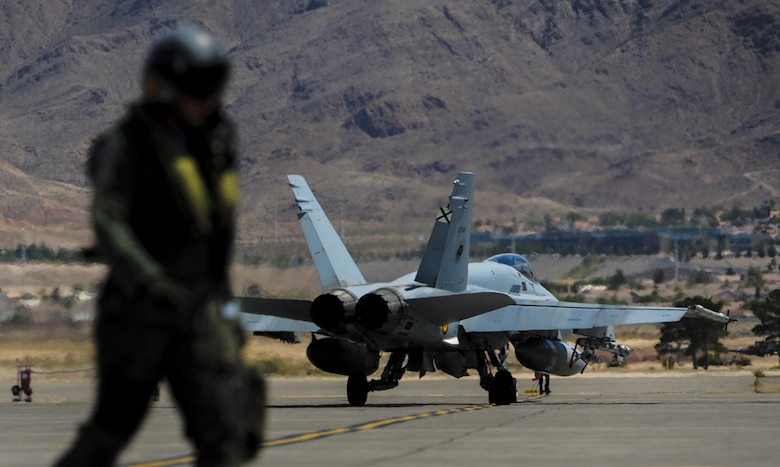 A Spanish air force EF-18M taxis down the runway before participating in Red Flag 16-4 at Nellis Air Force Base, Nev., Aug. 17, 2016. Flying units from around the globe deploy to Nellis AFB to participate in Red Flag, where it is held four times a year and organized by the 414th Combat Training Squadron. (U.S. Air Force photo by Airman 1st Class Kevin Tanenbaum/Released)