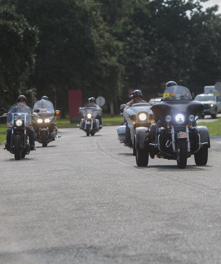 Members of various military and first-responder veteran motorcycle clubs escort a scaled-down replica of the Vietnam Memorial in Washington to Goldring/Woldenberg Great Lawn at City Park, New Orleans, Aug. 24, 2016. The Marine Corps brought the wall to New Orleans as part of a commemorative plan to honor and remember the 50th anniversary of the Vietnam War. The wall arrived in conjunction with Marine Forces Reserve’s Centennial celebration, which began with events in New Orleans this week. (U.S. Marine Corps photo by Sgt. Ian Leones/Released)