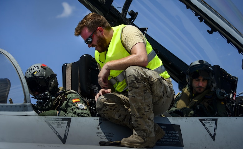 Aircrew from the Spanish air force assigned to the 121st Squadron, go through preflight checks on Aug. 18, 2016. All four branches of the U.S. military and air forces from allied nations participate in Red Flag. The training is conducted to familiarize forces to work together in future operations. (U.S. Air Force photo by Airman 1st Class Nathan Byrnes/Released)