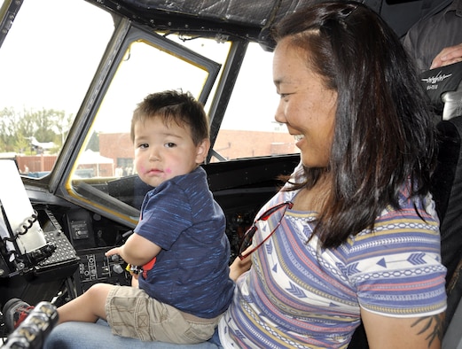 Brayden, 2, contemplates an engine startup on the C-130 Hercules with his mom during the annual Herc Adventure Tour at Peterson Air Force Base, Colo., Aug. 6, 2016. The Herc Adventure Tour provides Air Force Reservists and
their families the opportunity to tour the 302nd Airlift Wing's assigned aircraft as well as experience the equipment operated by several other organizations within the wing. Brayden's dad is Senior Airman Jeremy Gartz, an aerospace propulsion technician with the 302nd Maintenance Squadron.
(U.S. Air Force photo/2nd Lt. Stephen J. Collier)
