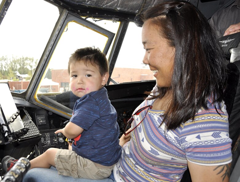 Brayden, 2, contemplates an engine startup on the C-130 Hercules with his mom during the annual Herc Adventure Tour at Peterson Air Force Base, Colo., Aug. 6, 2016. The Herc Adventure Tour provides Air Force Reservists and
their families the opportunity to tour the 302nd Airlift Wing's assigned aircraft as well as experience the equipment operated by several other organizations within the wing. Brayden's dad is Senior Airman Jeremy Gartz, an aerospace propulsion technician with the 302nd Maintenance Squadron.
(U.S. Air Force photo/2nd Lt. Stephen J. Collier)
