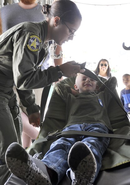 Aeromedical technicians with the 34th Aeromedical Evacuation Squadron give Rowdy an up-close look at what evacuated individuals feel when they are transported on C-130 Hercules aircraft during the annual Herc Adventure Tour at Peterson Air Force Base, Colo., Aug. 6, 2016. The Herc Adventure Tour provides Air Force Reservists and their families the opportunity to tour the 302nd Airlift Wing's assigned aircraft as well as experience the equipment operated by several other organizations within the wing. (U.S. Air Force photo/2nd Lt. Stephen J. Collier)