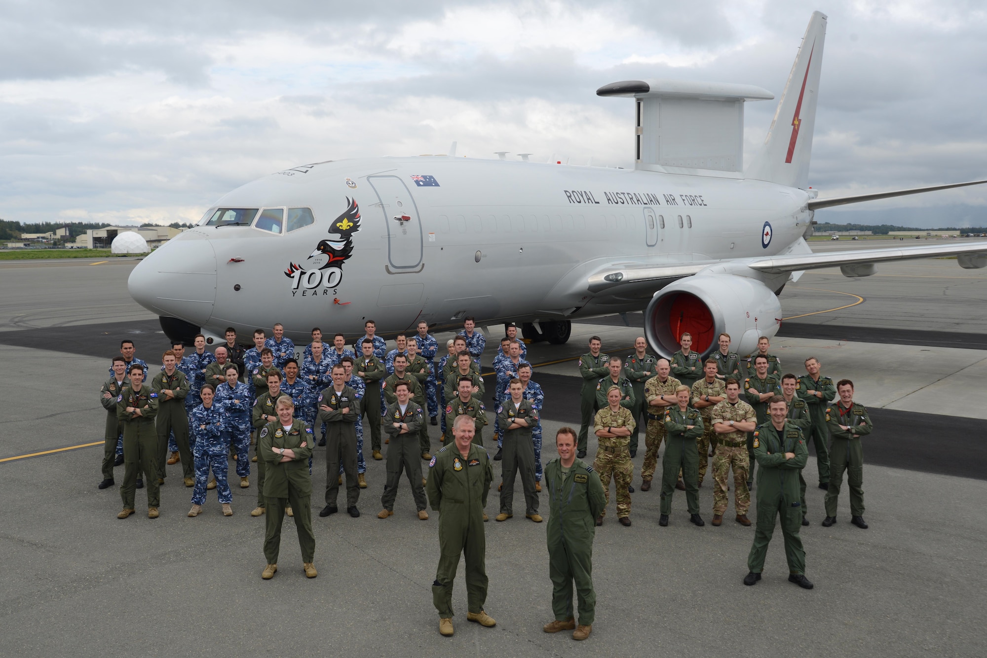 The 2nd Squadron, Royal Australian Air Force and 47th Squadron, Royal Air Force celebrate each other’s centenary during Red Flag 16-3 at Joint Base Elmendorf-Richardson, Alaska, Aug. 19, 2016. They posed in front of an E-7A Wedgetail, one of Australia’s most advanced air battlespace aircraft. Red Flag enables joint and international units to train together to improve their combat skills in a controlled environment. (U.S. Air Force photo by Airman 1st Class Christopher R. Morales)
