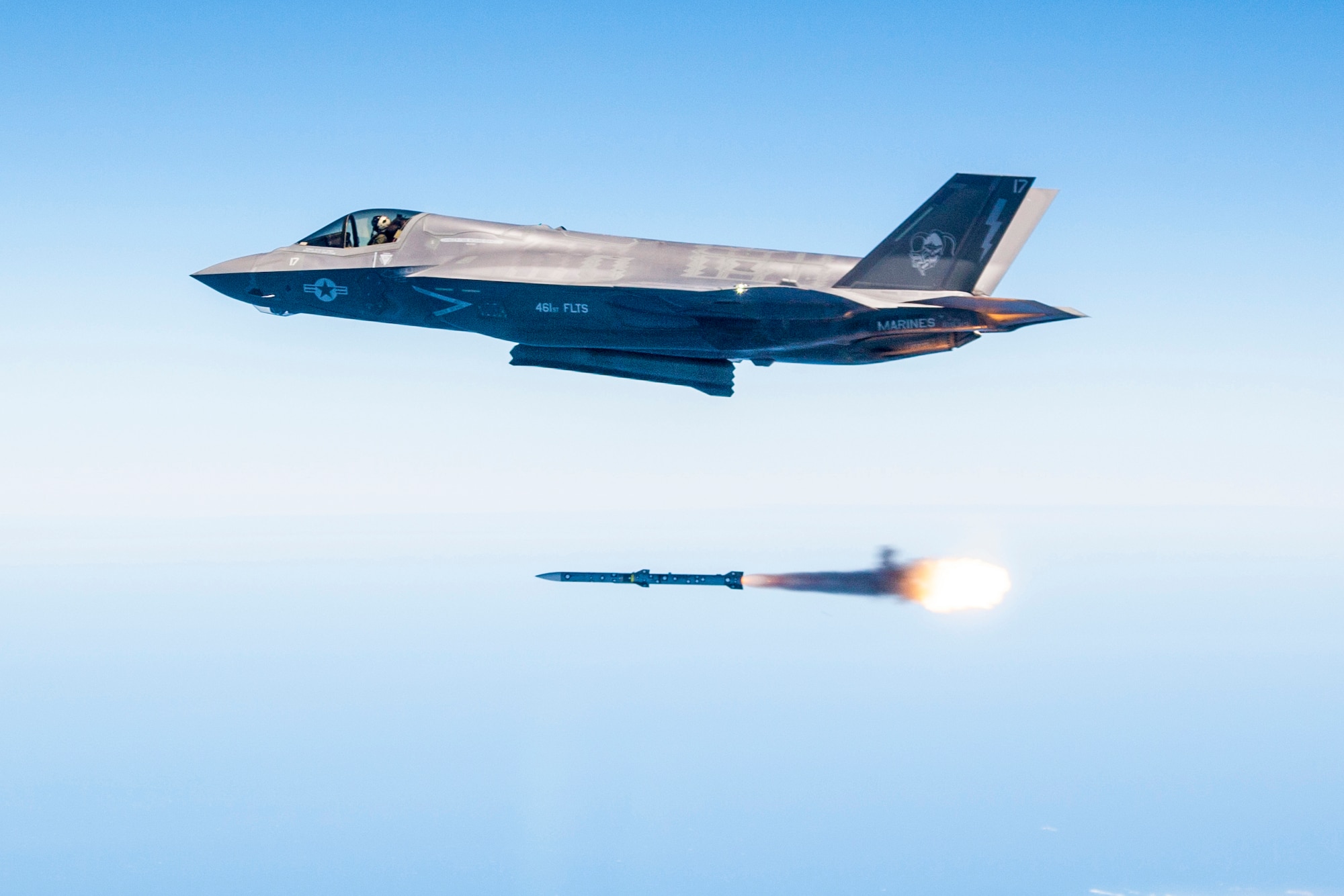 Maj. Douglas Rosenstock fires an AIM-120 missile from an F-35 during a recent weapons test surge here. By the end of the surge the F-35 Integrated Test Team released 30 weapons in 31 days, a first in flight test. (Photo by Darrin Russel/Lockheed Martin)