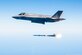 Maj. Douglas Rosenstock fires an AIM-120 AMRAAM from an F-35 Lightning II during a recent weapons test surge at Edwards Air Force Base, Calif. By the end of the surge the F-35 Integrated Test Team released 30 weapons in 31 days, a first in flight testing. (Lockheed Martin photo/Darrin Russel)