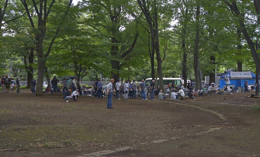 Homeless people wait in an open area to receive food at Ueno Park, Tokyo, Japan, Aug. 19, 2016. Approximately 350 to 400 people were fed at the event. (U.S. Air Force photo by Senior Airman David Owsianka/Released)