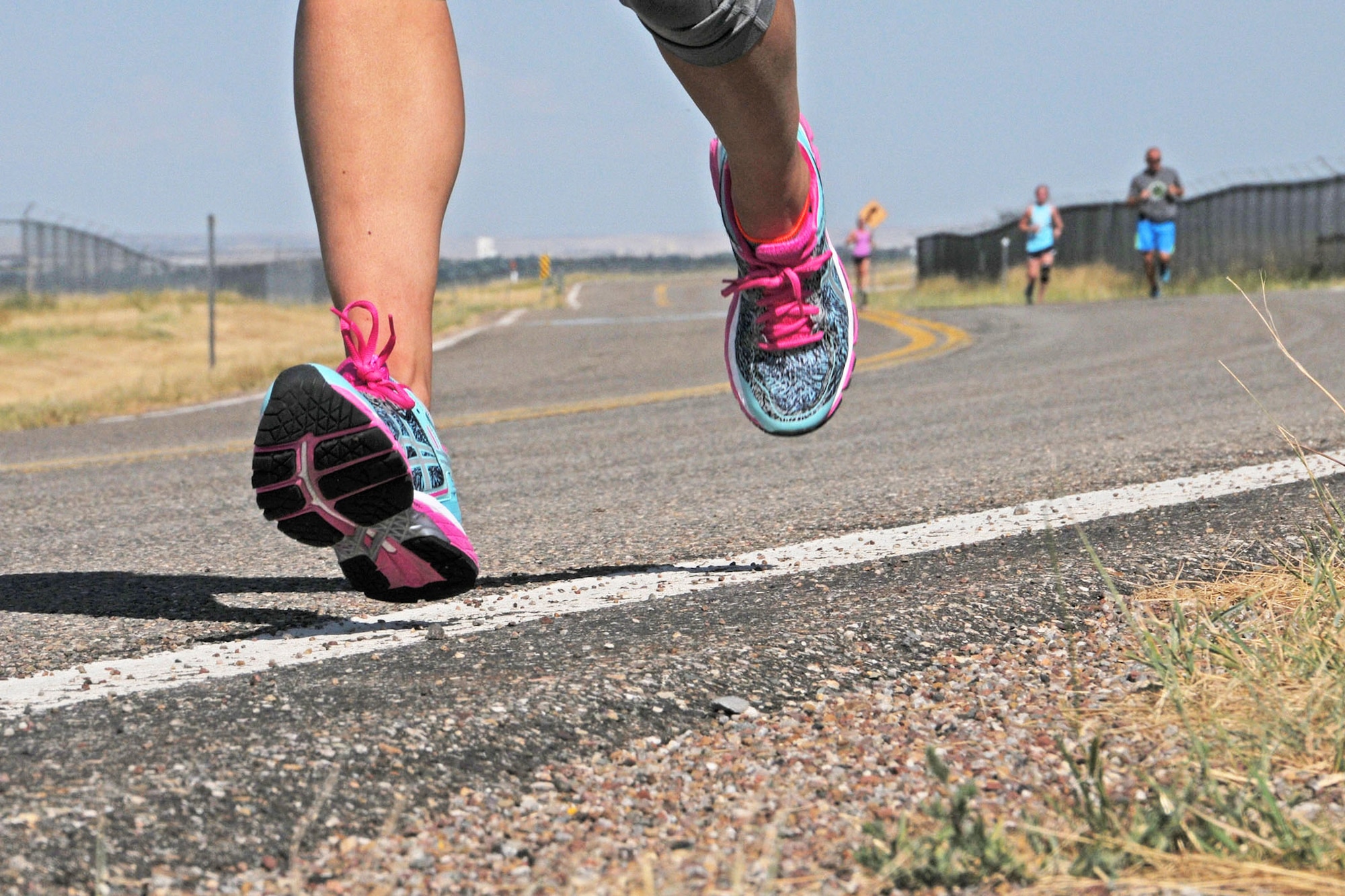 Montana Air National Guard members train for the Air Force Marathon Aug. 15, 2016, in Great Falls, Mont. by putting their shoes to the pavement. The 20th annual AF Marathon will be located in Dayton, Ohio, Sept. 17. (U.S. Air National Guard photo/Staff Sgt. Lindsey Soulsby/Released)