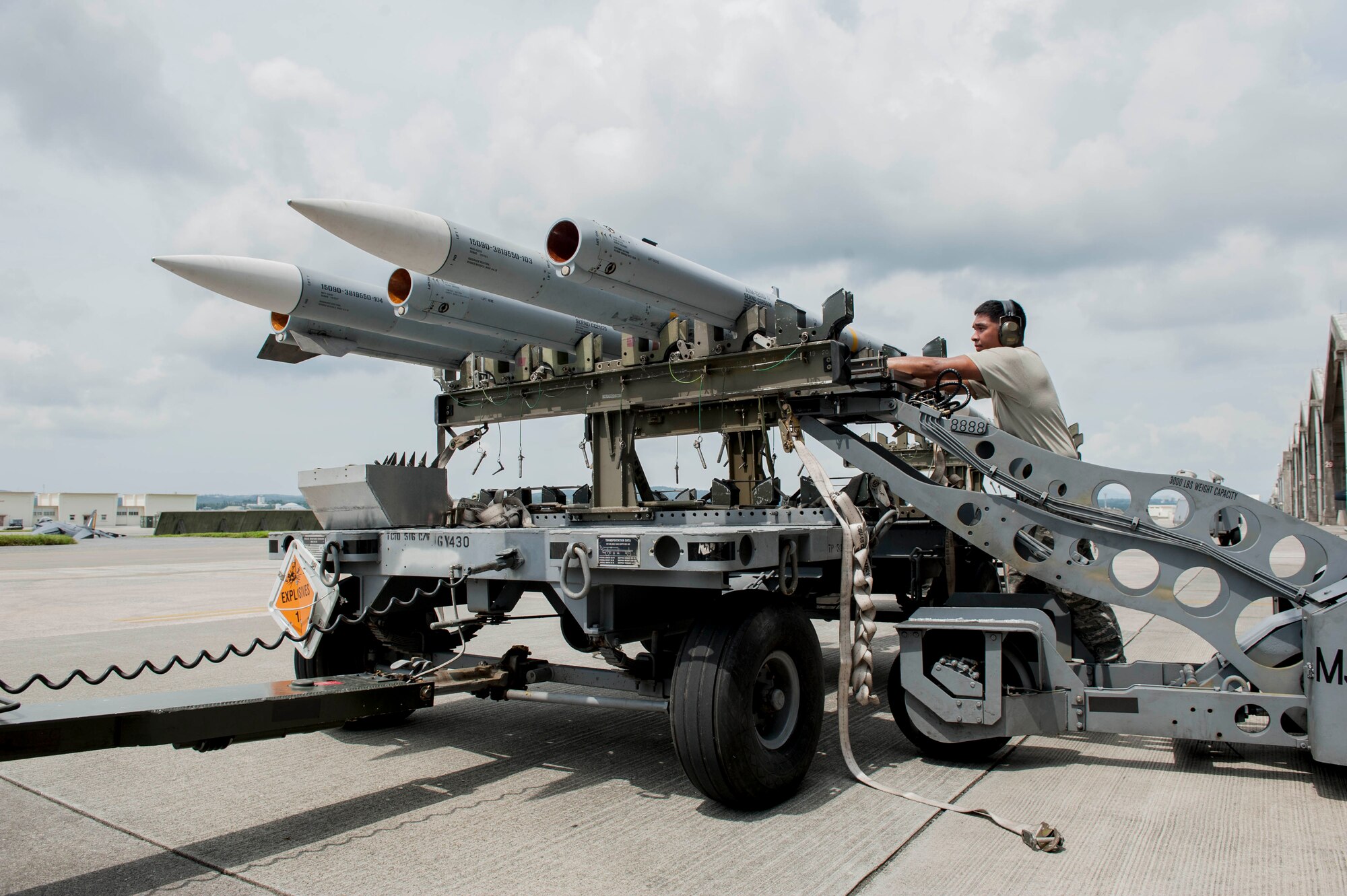 Maintainers from the 18th Aircraft Maintenance Squadron and pilots assigned to the 44th and 67th Fighter Squadrons conduct a mass aircraft generation exercise Aug. 22 and 23, at Kadena Air Base, Japan. Maintainers loaded AIM-9 sidewinder missiles, AIM-120 advanced medium-range air-to-air missiles, flares, and M-61A1 cannon rounds onto F-15 Eagles, before the aircraft taxied and were dispersed around the flight line. Kadena participates in a variety of routine training exercises throughout the year to maintain a consistent high standard of readiness and expertise. F-15s assigned to Kadena Air Base taxied on the flight line during a training exercise Aug. 23 while loaded with live ammunition. This training was not in response to or in anticipation of any regional concerns. While no planes took off from the flightline, this routine exercise helped ensure Kadena’s ability to provide air superiority in the defense of Japan and promoting peace and stability throughout the Indo-Asia-Pacific region. (U.S. Air Force photo by Senior Airman Peter Reft/Released)
