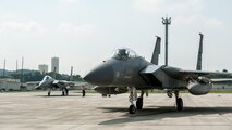Maintainers from the 18th Aircraft Maintenance Squadron and pilots assigned to the 44th and 67th Fighter Squadrons conduct a mass aircraft generation exercise Aug. 22 and 23, at Kadena Air Base, Japan. Maintainers loaded AIM-9 sidewinder missiles, AIM-120 advanced medium-range air-to-air missiles, flares, and M-61A1 cannon rounds onto F-15 Eagles, before the aircraft taxied and were dispersed around the flight line. Kadena participates in a variety of routine training exercises throughout the year to maintain a consistent high standard of readiness and expertise. F-15s assigned to Kadena Air Base taxied on the flight line during a training exercise Aug. 23 while loaded with live ammunition. This training was not in response to or in anticipation of any regional concerns. While no planes took off from the flightline, this routine exercise helped ensure Kadena’s ability to provide air superiority in the defense of Japan and promoting peace and stability throughout the Indo-Asia-Pacific region. (U.S. Air Force photo by Senior Airman Peter Reft/Released)
