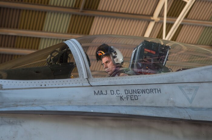 U.S. Marine Corps Maj. David Dunsworth, an F/A-18C Hornet pilot with Marine Fighter Attack Squadron (VMFA) 122, prepares to taxi out of a hangar during Southern Frontier at Royal Australian Air Force Base Tindal, Australia, Aug. 24, 2016. VMFA-122 executed close air support missions for ground combat units conducting exercises at Bradshaw Range Complex. Southern Frontier is a three week unit level training evolution helping the flying squadron gain qualifications and experience in low, air ground, high explosive ordnance delivery. (U.S. Marine Corps photo by Cpl. Nicole Zurbrugg)