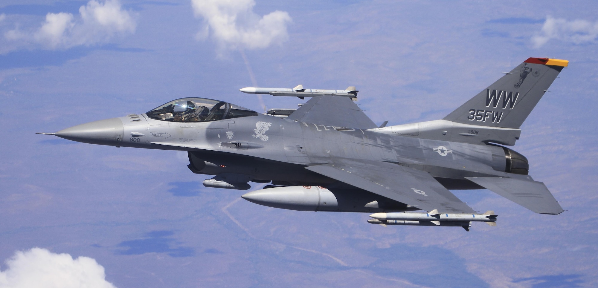 An F-16 Fighting Falcon with the 14th Fighter Squadron assigned to Misawa Air Base, Japan, flies over the skies of Australia during exercise Pitch Black 16, Aug. 12, 2016. Pitch Black is a Royal Australian Air Force biennial international engagement designed to exercise participant tasks, evaluate proficiency and identify future training and other actions that improve alliance capabilities. (Courtesy photo by Leroy Simpson)