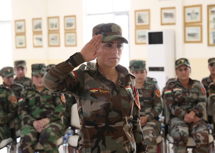 A Zeravani soldier salutes during a graduation ceremony at Bnaslawa, Iraq, Aug. 11, 2016. The  Zeravani, a specialized branch of the Peshmerga soldiers, completed a three-week basic infantry training course taught by Italian trainers. The building partner capacity mission aims to increase the security capacity of local forces fighting the Islamic State of Iraq and the Levant. 