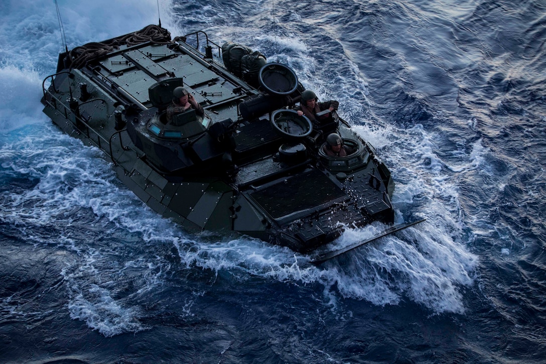 Marines with Company G, Battalion Landing Team, 2nd Battalion, 4th Marines, embarked aboard the USS Germantown, conduct splash-and-recovery drills with Amphibious Assault Vehicles while underway as part of the 31st Marine Expeditionary Unit and Bonhomme Richard Expeditionary Strike Group, August 23, 2016. Company G is the 31st MEU’s mechanized assault element specializes in ship-to-shore movement of Marine infantry. The 31st MEU is the Marine Corps’ only continuously forward-deployed Marine Air-Ground Task Force. The 31st MEU combines air-ground-logistics into a single team capable of addressing a wide variety of military operations in the Asia-Pacific region, from force projection and maritime security to humanitarian assistance and disaster relief. 