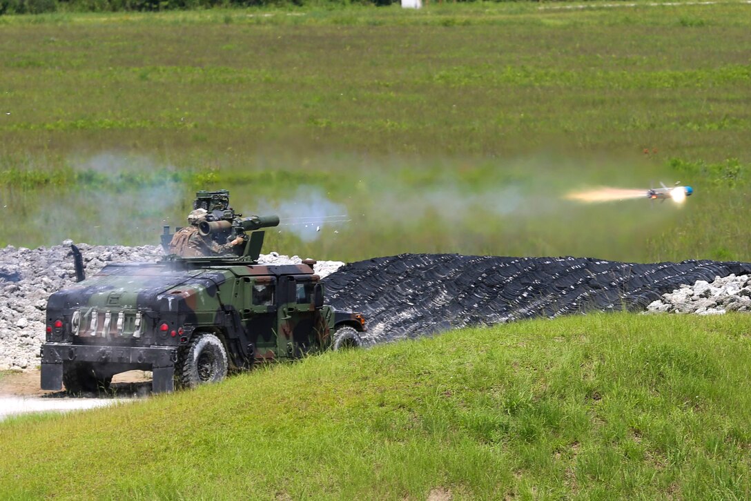 Marines with 3rd Battalion, 6th Marine Regiment fire a Tube-launched, Optically tracked, Wire-guided missile during a battle drill at Marine Corps Base Camp Lejeune, N.C., August 23, 2016.  The Marines performed basic fire and maneuver drills with the Saber Missile System and simulated combat situations. 