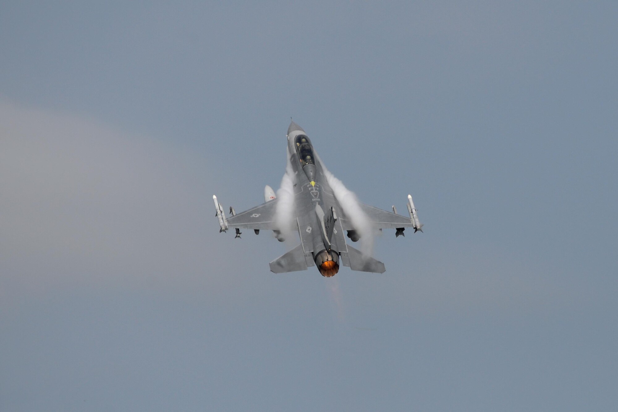 An F-16D Fighting Falcon, piloted by Col. John R. DiDonna, the commander of the New Jersey Air National Guard’s 177th Fighter Wing, takes off in afterburner with Brig. Gen. Robert C. Bolton in the back seat for his "fini flight" at the Atlantic City Air National Guard Base in Egg Harbor Township, N.J., Aug. 16, 2016. (U.S. Air Force photo/Master Sgt. Andrew J. Moseley)
