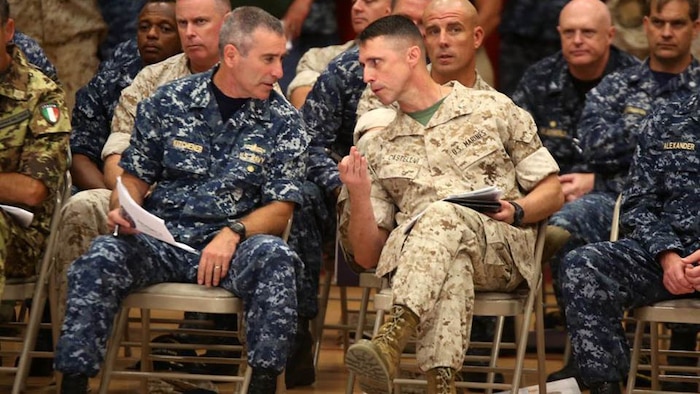 (Left to right) U.S. Navy Rear Adm. Roy Kitchener, the commander of Expeditionary Strike Group 2, speaks with Brig. Gen. Robert F. Castellvi, the commanding general of 2nd Marine Expeditionary Brigade, during a rehearsal of concepts drill as part of Bold Alligator 2016 in Norfolk, Virginia, Aug. 13, 2016. BA16 focuses on improving Navy-Marine Corps amphibious core competencies along with coalition, North Atlantic Treaty Organization, Allied and partner nations as an investment in the current and future readiness of naval forces. BA16 is taking place Aug. 15-26, 2016, along the eastern seaboard. 
