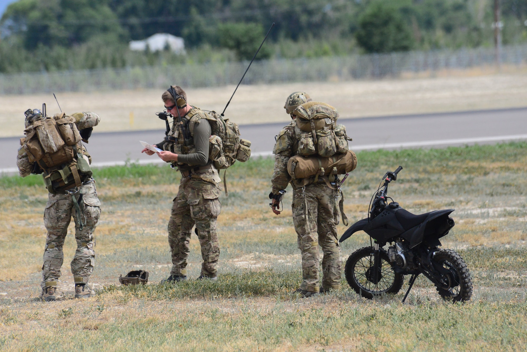 Special Tactics Airmen prepare to set up a Forward Air Refueling Point during a training exercise in Montrose, Colo., July 26, 2016. The full mission profile provided these Airmen an opportunity to practice their core competencies and hone their skills in unfamiliar terrain similar to what they might encounter overseas. (U.S. Air Force photo/Staff Sgt. Eboni Reams)

