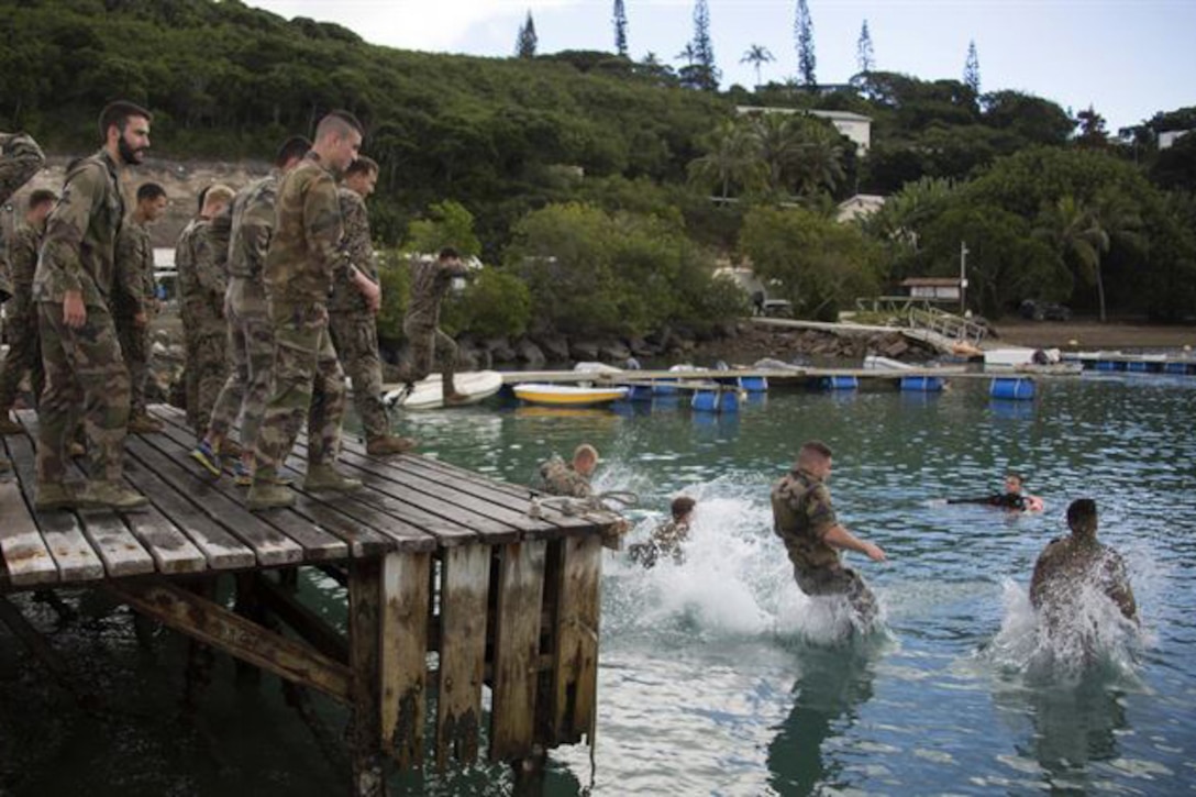 U.S. Marines and French soldiers jump into the ocean during a commando course off the coast of Noumea, New Caledonia, Aug. 15, 2016. The course is a part of Exercise AmeriCal 16. 
Marine photo by Sgt. Carlos Cruz Jr.