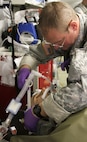 FORT MCCOY, Wis -- An Army Reserve Soldier from the 75th Combat Support Hospital out of San Antonio, Texas, attaches a ventilator breathing tube onto the mouth of a training mannequin during the Global Medic Exercise at Fort McCoy, Wis. on Aug. 20, 2016. Global Medic is an inter-service training event that develops and evaluates the collective skills of Army Reserve Soldiers and other service members in a collaborative environment. (U.S. Army Reserve photo by Spc. Christopher A. Hernandez, 345th Public Affairs Detachment)