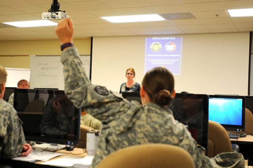Penny Gietzen, standing, the command Sexual Assault Response Coordinator for 88th Regional Support Command, takes questions from the Soldiers attending the Sexual Harassment/Assault Response and Prevention (SHARP) Foundation Course at Fort McCoy, Wisconsin, August 9. The two-week course was the second of two taught at the 88th RSC Headquarters and helps prepare Soldiers to fill the duties of a victim advocate at their assigned units.