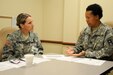 Major Amanda Owens, 418th Civil Affairs Battalion, conducts a victim interview with Capt. Sedoria Outlaw, First Army, during the Sexual Harassment/Assault Response and Prevention (SHARP) Foundation Course presented by the 88th Regional Support Command at Fort McCoy, Wisconsin, August 11.