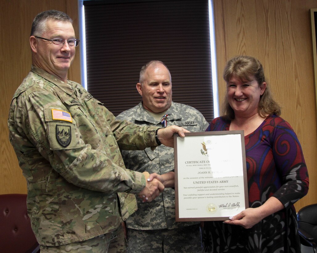 Maj. Gen. Ricky Waddell, Commanding General of the 76th Operational Response Command presented the Army Certificate of Appreciation to Mrs. Peters for her contributions in support of her husband’s career, during retired Sgt. Maj. Stephen Peters' retirement ceremony held Sunday, here at Fort Douglas, Utah.