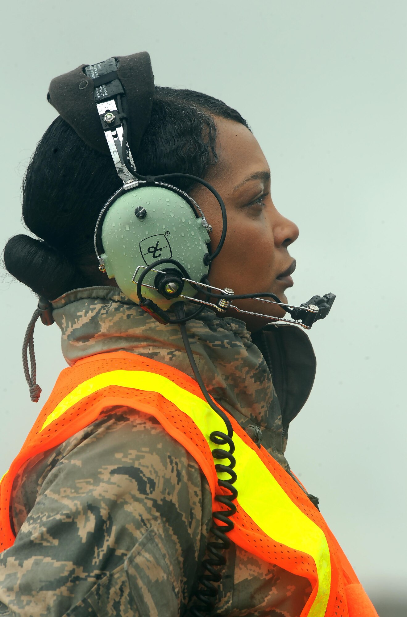 U.S. Air Force Chief Master Sgt. Melvina Smith, the 509th Bomb Wing command chief, stands ready before marshaling a B-2 Spirit aircraft at Andersen Air Force Base, Guam, Aug. 23, 2016. Smith was given the opportunity to marshal for Brig. Gen. Paul W. Tibbets, the 509th Bomb Wing commander who flew in a Bomber Assurance and Deterrence mission, while visiting Airmen deployed from Whiteman Air Force Base, Mo.  (U.S. Air Force photo by Senior Airman Jovan Banks)