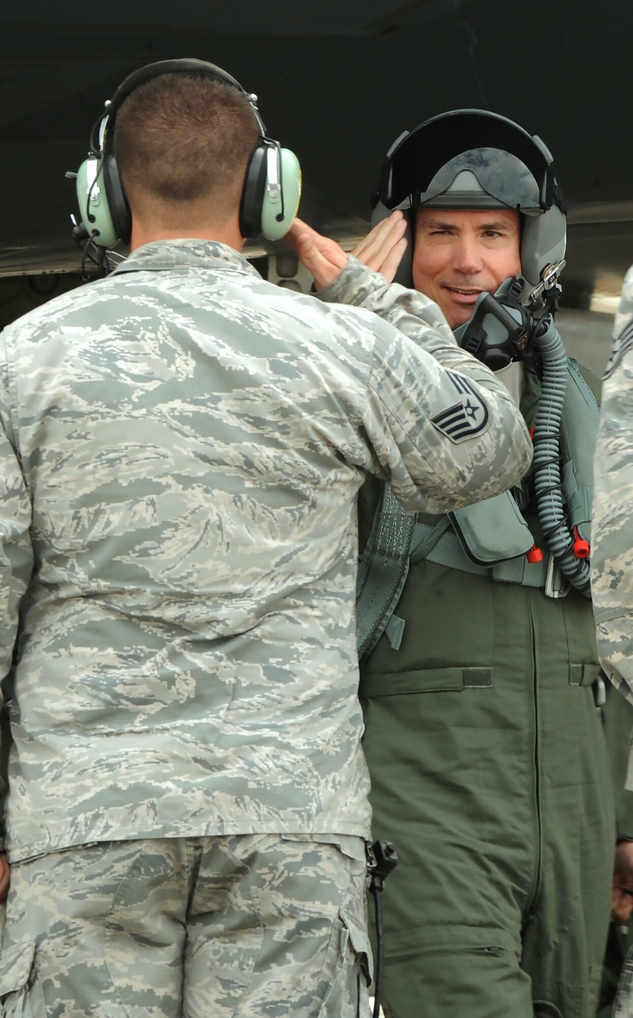 U.S. Air Force Brig. Gen. Paul W. Tibbets IV, the 509th Bomb Wing commander, salutes an Airman after flying a Bomber Assurance and Deterrence (BAAD) mission at Andersen Air Force Base, Guam, Aug. 23, 2016. Tibbets visited his Airmen deployed from Whiteman Air Force Base, Mo., and flew a BAAD mission in a B-2 Spirit aircraft, demonstrating the U.S. commitment to supporting global security. (U.S. Air Force photo by Senior Airman Jovan Banks) 