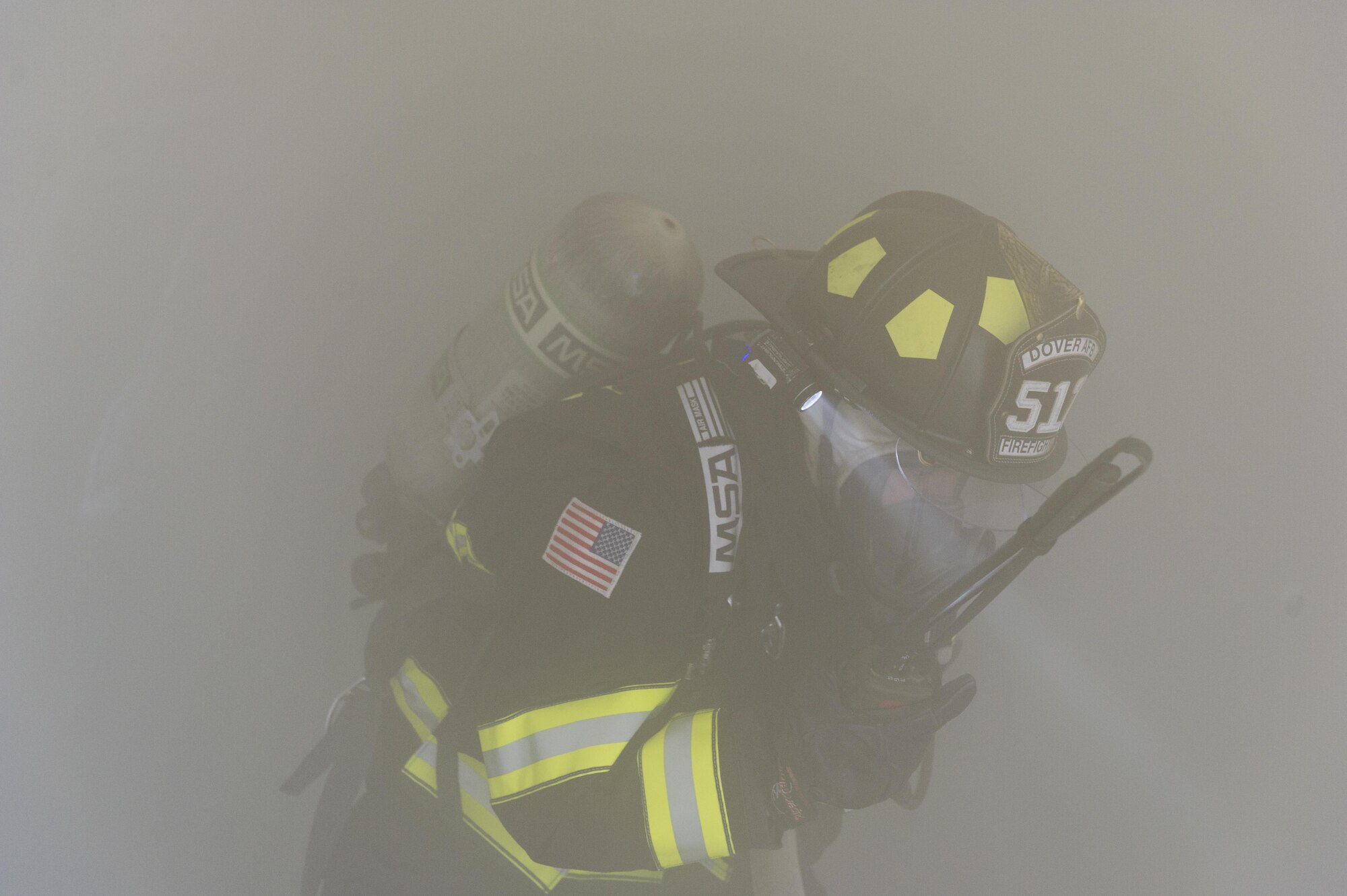 U.S. Air Force Senior Airman Ricky Moralez, firefighter, 512th Civil Engineering Squadron, Dover Air Force Base, Del., conducts a secondary sweep in a simulated tent fire at Tactical Assembly Area Young, Fort McCoy, Wis., August 16, 2016, during exercise Patriot Warrior. Patriot Warrior is the Air Force Reserve's premier contingency deployment training exercise, designed to demonstrate training ranging from bare base buildup to full operational capabilities. More than 11,000 members from the U.S. service branches and their Reserve components, including Air Force, Army, Navy, and Marines are participating alongside British, Canadian, and Saudi Arabian forces. (U.S. Air Force photo/Staff Sgt. Kyle Brasier)