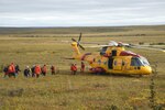 Pararescue jumpers with the 212th Rescue Squadron, Joint Base Elmendorf-Richardson, Alaska, evacuate patients using a Royal Canadian Air Force helicopter during Exercise Arctic Chinook Aug. 24, 2016.  Exercise Arctic Chinook is a joint U.S. Coast Guard and U.S. Northern Command-sponsored exercise on the U.S. State Department approved list of Arctic Council Chairmanship events. The Arctic mass rescue operation exercise scenario consisted of an adventure-class cruise ship with approximately 200 passengers and crew that experience a catastrophic event with the need to abandon ship. Arctic Chinook exercised elements of the Arctic Search and Rescue Agreement to include interoperability, cooperation, information sharing, SAR services, and joint exercise review. 