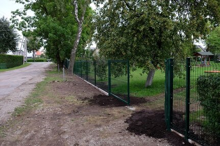 SIAULIAI, Lithuania – Army Reserve Soldiers from the 7th Mission Support Command helped coordinate the construction of a new fence and gate and sign for the local ‘infant’ or ‘baby’ orphanage with USAR Soldiers from the 412th Theater Engineer Command and Lithuanian Soldiers and Airmen and local national contractors, Aug. 8-25, 2016. 
 (Photo by Sgt. 1st Class Matthew Chlosta, 7th MSC Public Affairs Office)