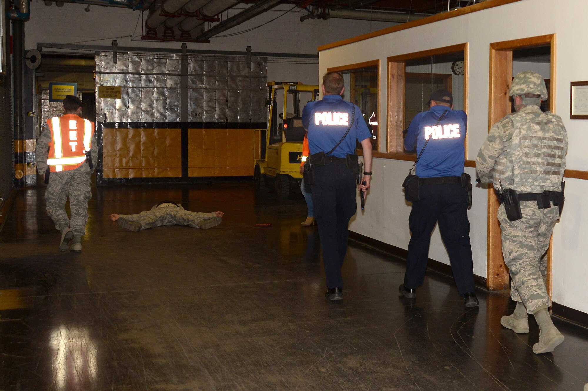 The U.S. Air Force Academy held an active shooter exercise Aug. 23, 2016. The Academy maintains readiness to respond to emergencies such as active shooters by conducting training exercises multiple times a year. The 10th Security Forces Squadron, Civil Engineer Squadron and Medical Group were able to quickly respond to the exercise scenario, neutralize the threats and evacuate the victims. (U.S. Air Force photo by Darcy Ibidapo) 