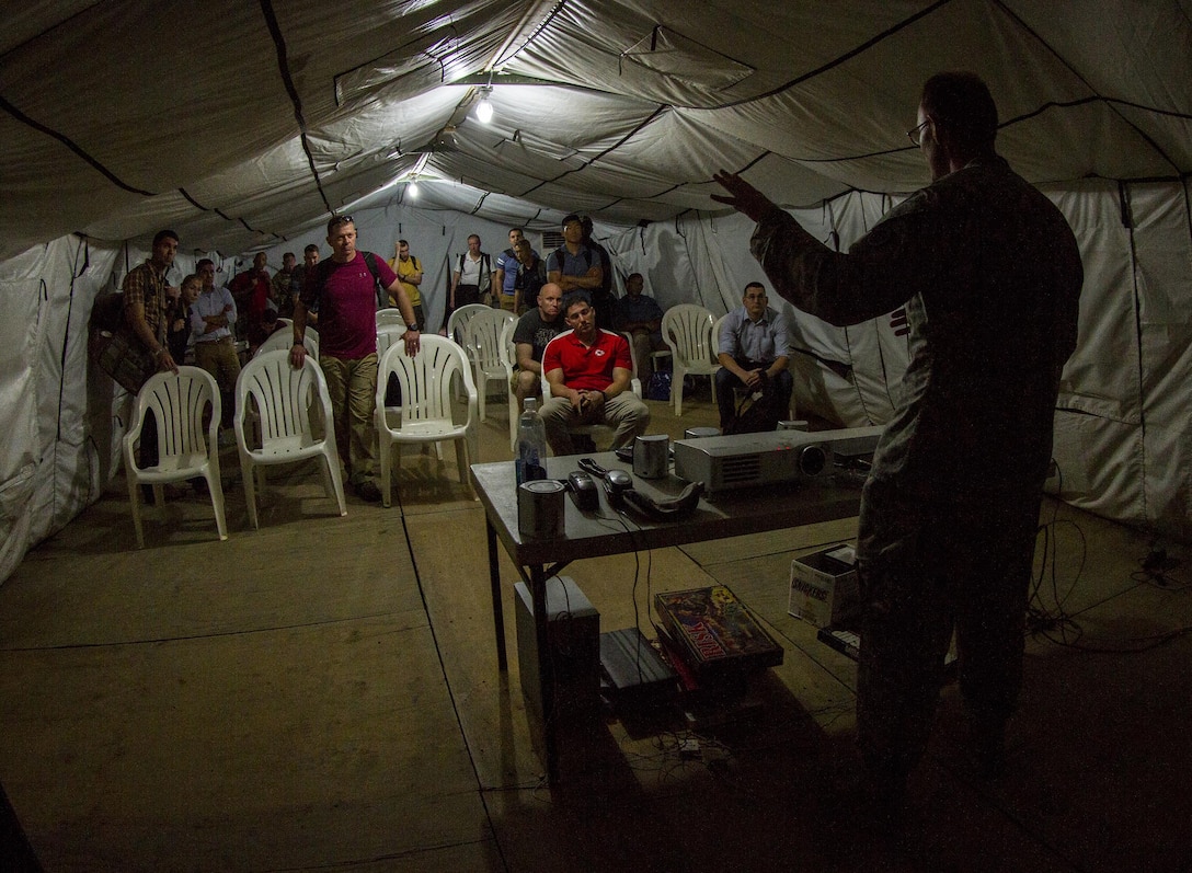 U.S. Army Capt. Robert Arkell, I Corps Headquarters Support Company commander - who hails from Houston, Texas - briefs soldiers as they arrive at Yongin, South Korea to participate in a two-week training exercise Aug. 22, 2016. (U.S. Army photo by Staff Sgt. Ken Scar)