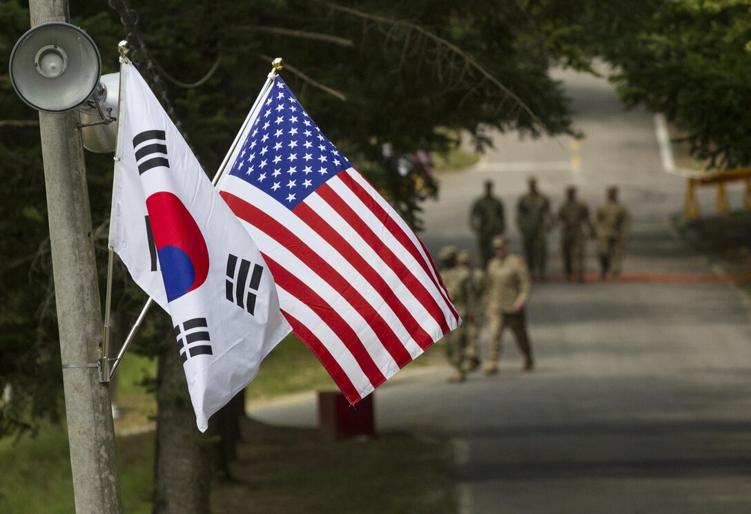 The Korean and American flags fly next to each other at Yongin, South Korea, Aug. 23, 2016. (U.S. Army photo by Staff Sgt. Ken Scar)