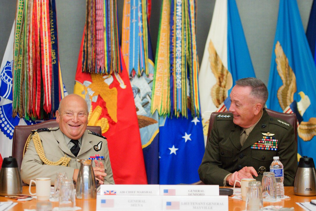 Marine Corps Gen. Joe Dunford, right, chairman of the Joint Chiefs of Staff, talks with Air Chief Marshal Sir Stuart Peach, chief of the Defense Staff of the United Kingdom, during a visit at the Pentagon Aug. 26, 2016. DoD photo by Navy Petty Officer 2nd Class Dominique A. Pineiro