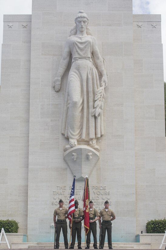 HONOLULU — The Marine color guard for Marine Fighter Attack Squadron 115, “Silver Eagles,” stand at attention during a wreath laying at the National Memorial Cemetery of the Pacific in Honolulu, July 29, 2016. Marines paid tribute to 1st Lt. Jack Aldrich, the first pilot killed from that squadron. With a long history of participating in almost every major conflict since their formation 73 years ago, VMFA-115 honored their fallen comrade. Marines from VMFA-115, stationed aboard Marine Corps Air Station Beaufort, S.C., were in Hawaii participating in the 2016 Rim of Pacific exercise, the largest maritime exercise in the world. Between aircraft maintenance and training, Marines remembered the legacy of Aldrich. (Marine Corps Photo by Lance Cpl. Jesus Sepulveda Torres)