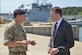 Eric Fanning, Secretary of the Army, speaks with British army Maj. Adrian Spicer, 7th Transportation Brigade (Expeditionary) operations department, at Fort Eustis, Va., Aug. 25, 2016. During his visit at Third Port, Fanning viewed two vessels as well as Army diving operations.  (U.S. Air Force photo by Staff Sgt. Natasha Stannard)